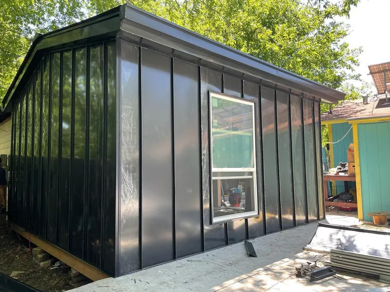 Black standing seam metal wall panels for Metal Roof Installation in Mishawaka