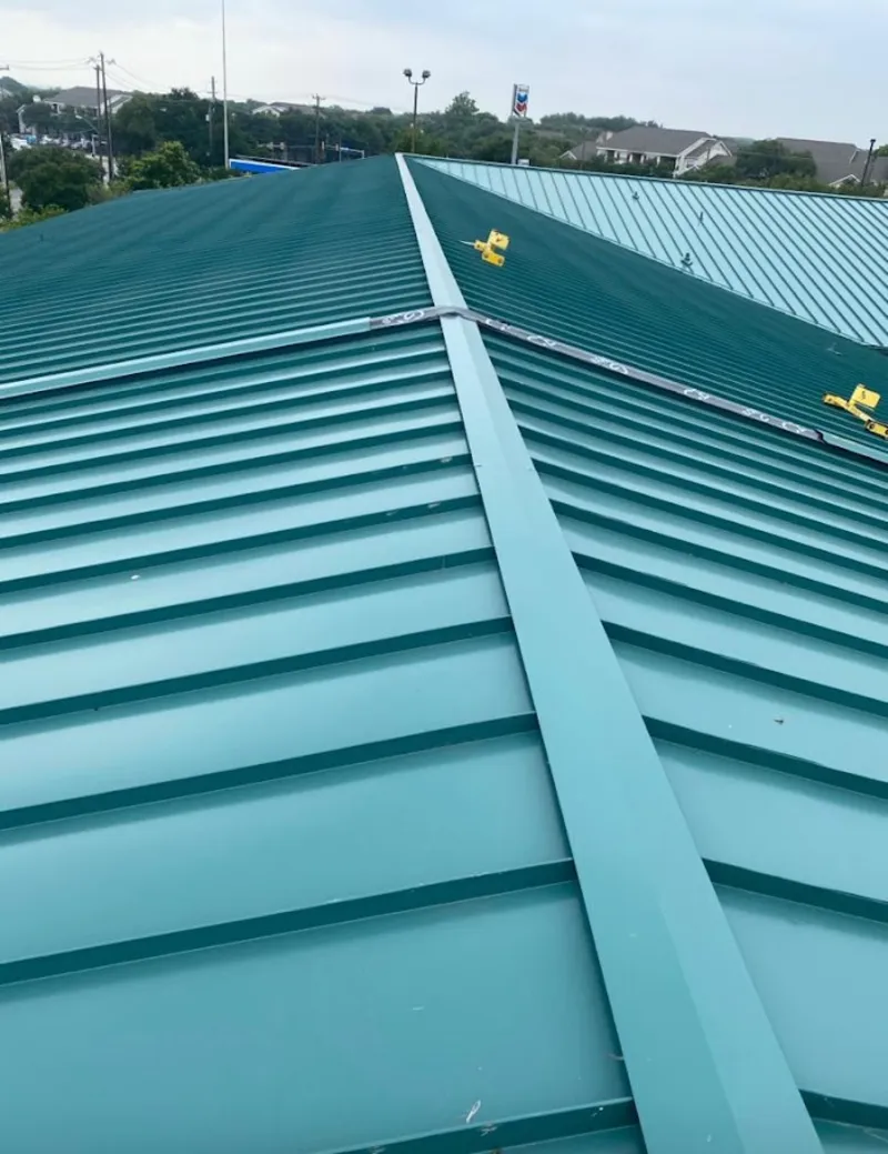 Green commercial metal roof ridge and valley for Metal Roof Repair in Mishawaka